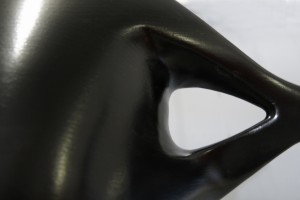 This photo shows a detail of a black lacquered pendant lamp