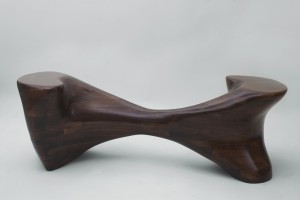 Sculpted walnut tête-à-tête seen in profile