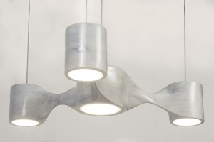 This is a bleached cherry chandelier sculpted by hand shown from straight on